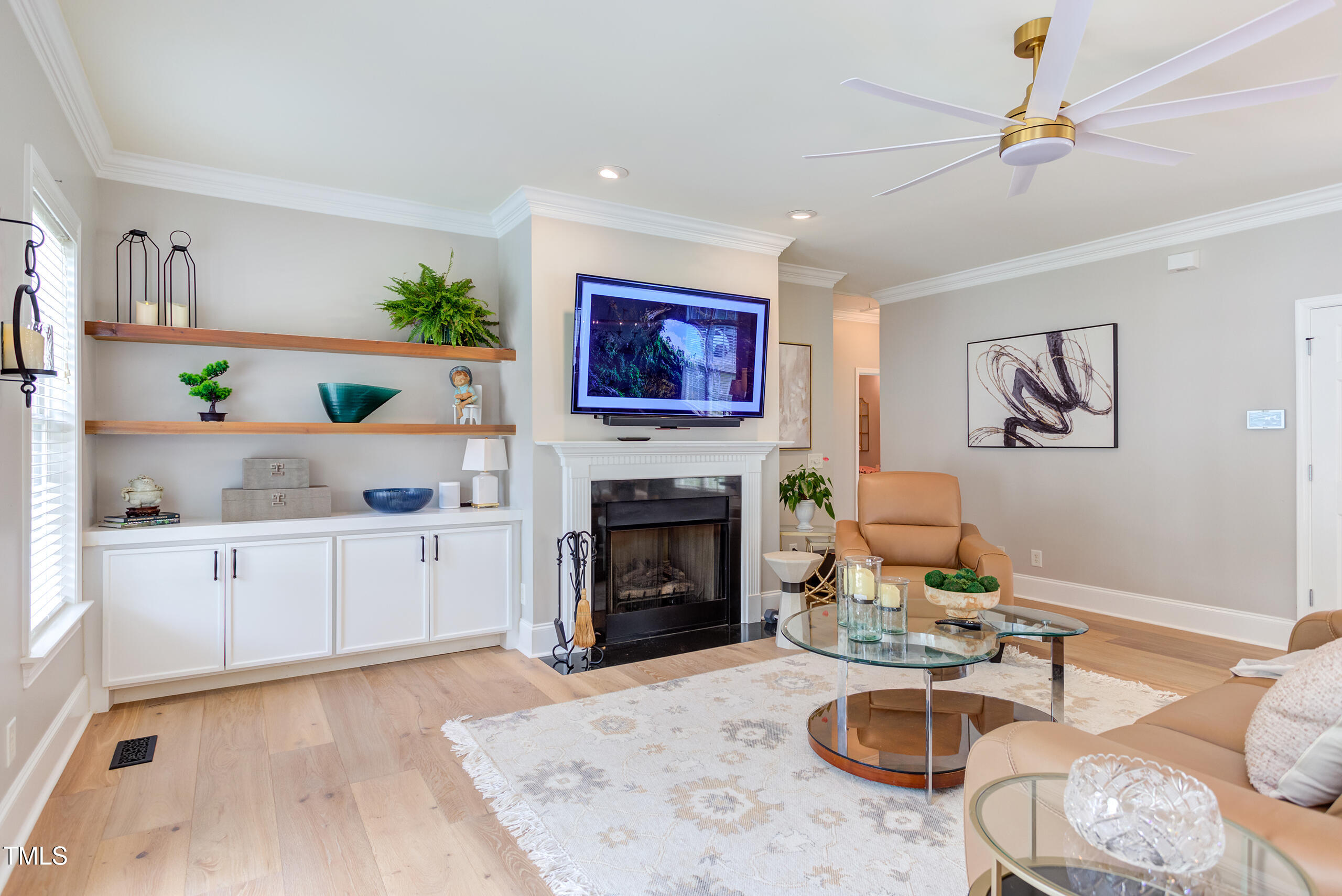 4191 Bobbitt Road Kittrell, NC 27544 - Photo 26 of 89 a living room with furniture a fireplace and a flat screen tv