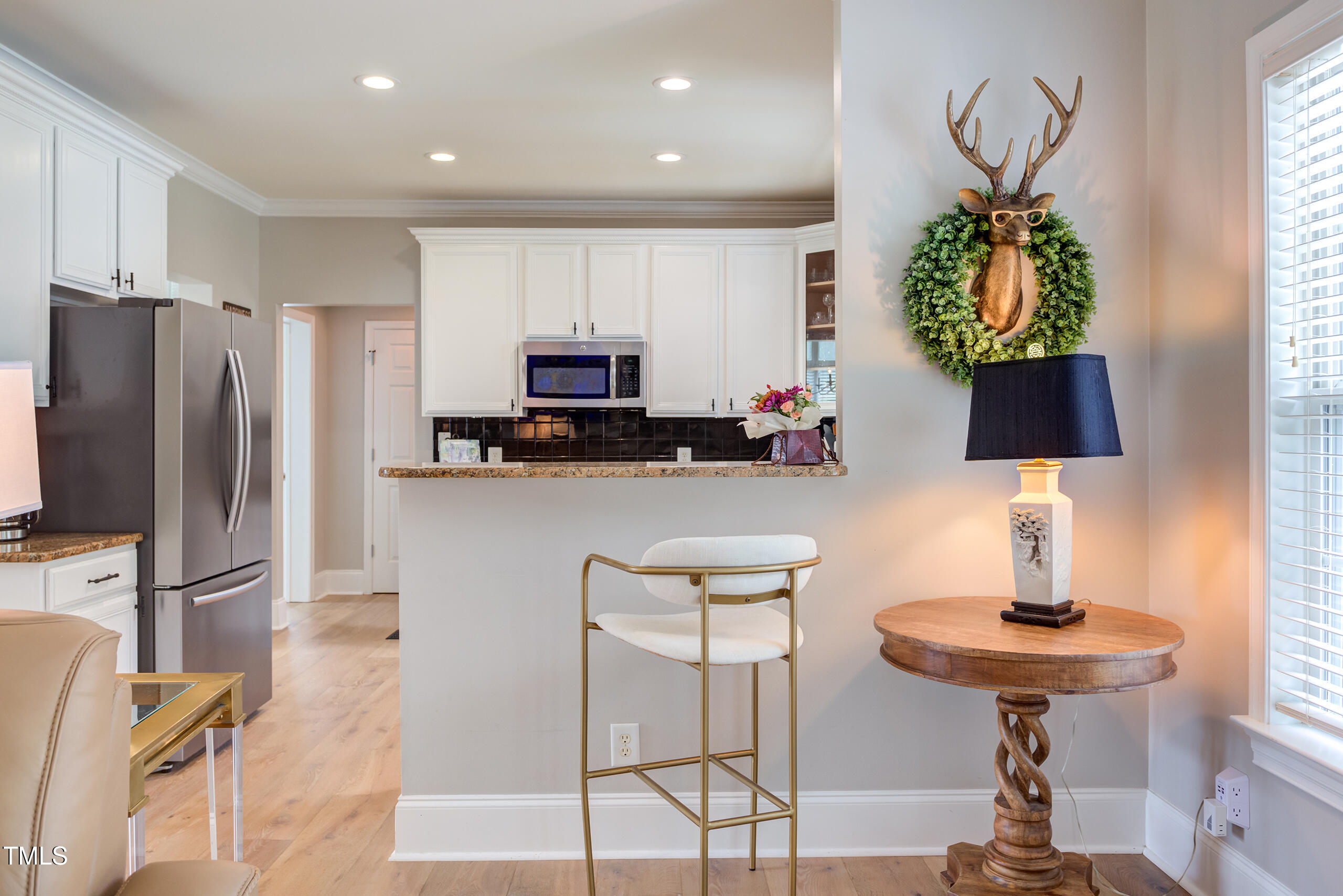 4191 Bobbitt Road Kittrell, NC 27544 - Photo 29 of 89 a kitchen with stainless steel appliances a microwave a refrigerator and a sink