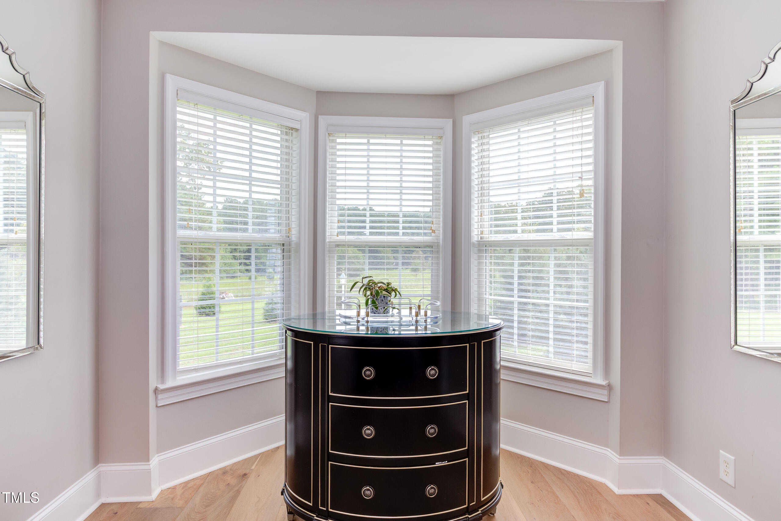 4191 Bobbitt Road Kittrell, NC 27544 - Photo 35 of 89 a table and chair in a room next to a window