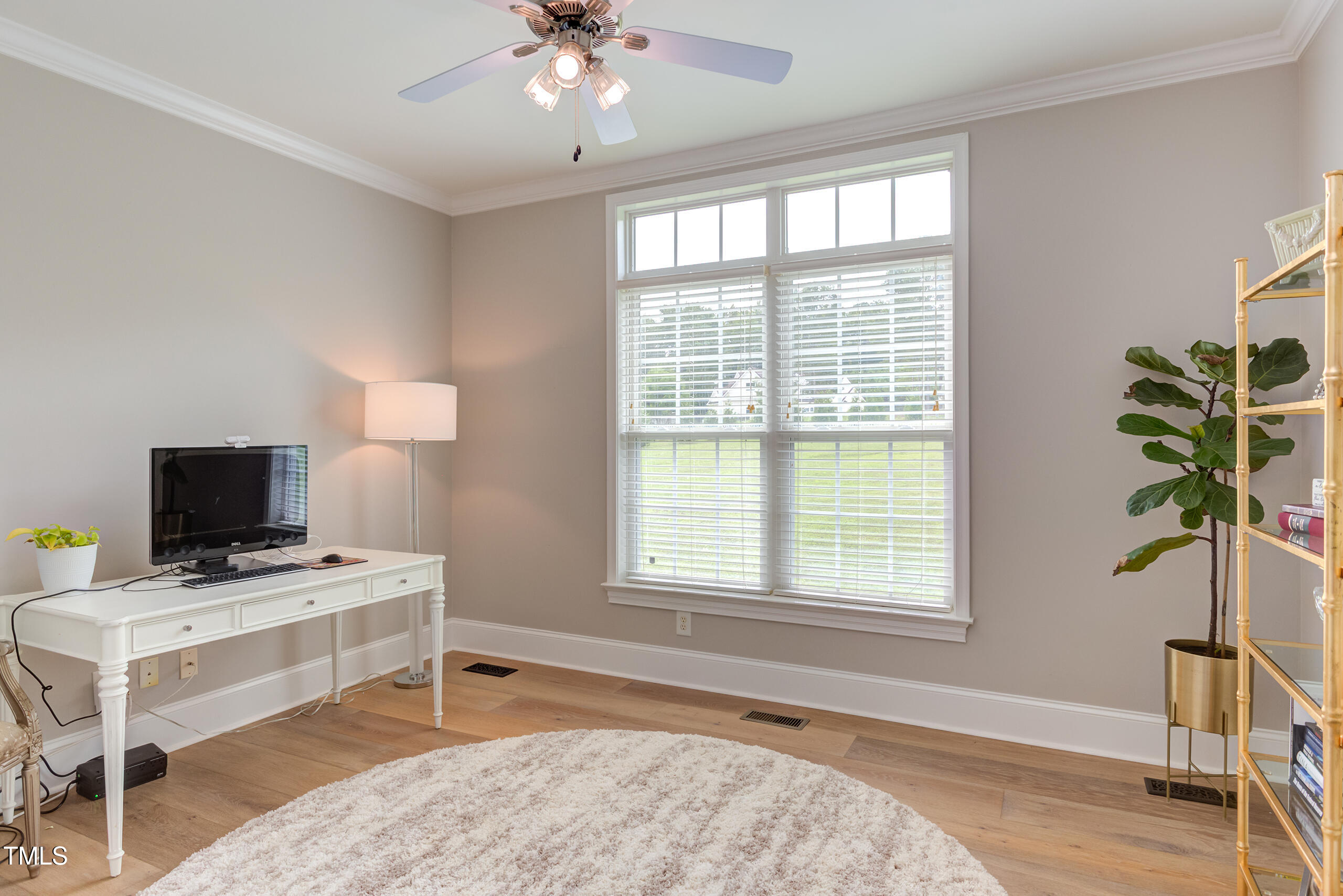 4191 Bobbitt Road Kittrell, NC 27544 - Photo 45 of 89 a livingroom with a window and a flat screen tv