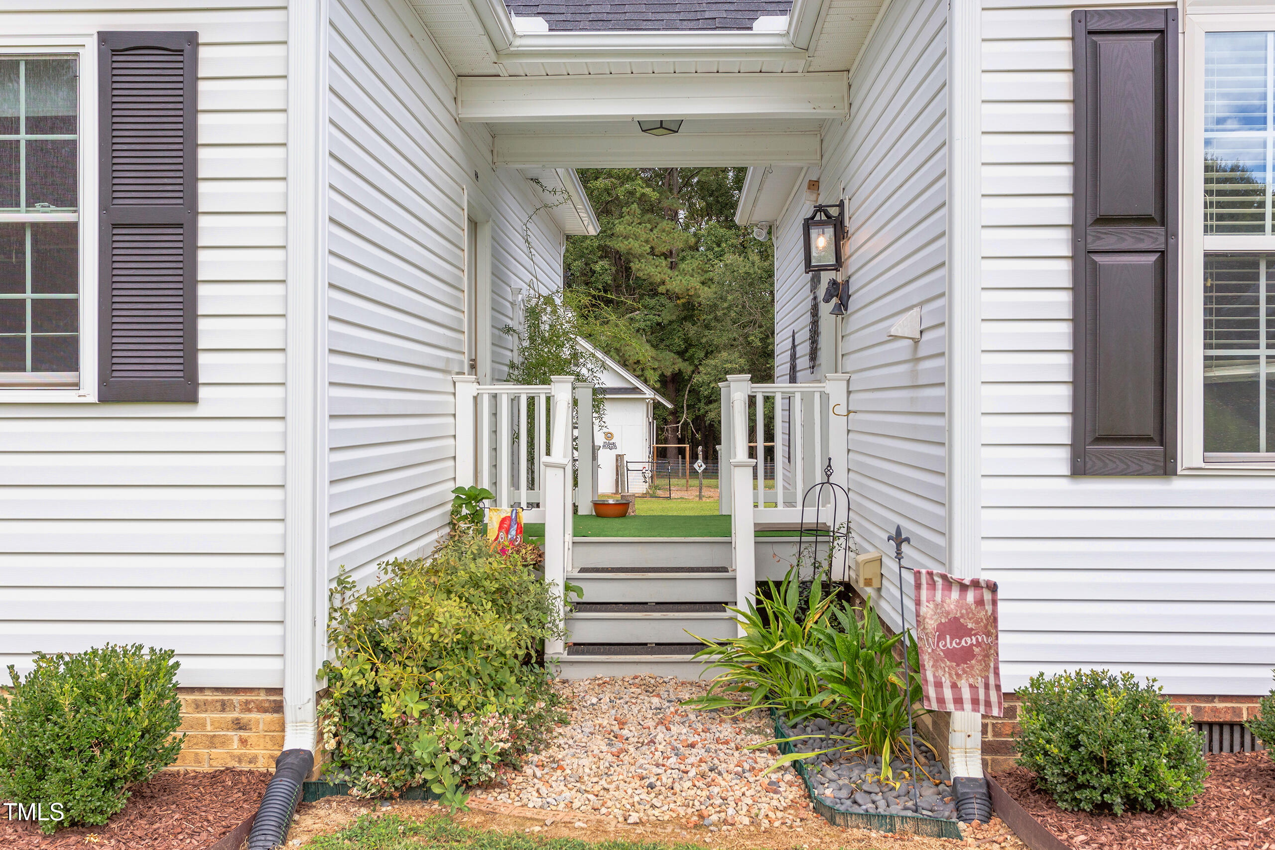 4191 Bobbitt Road Kittrell, NC 27544 - Photo 5 of 89 a view of a pathway with a house in the background
