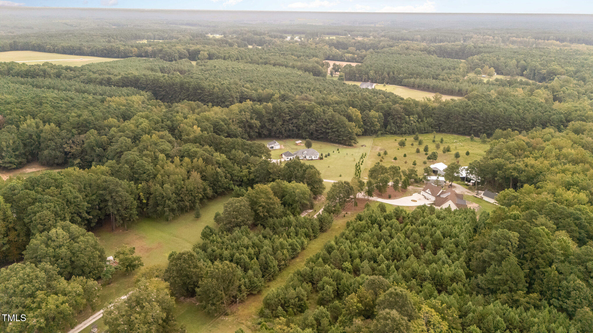 4191 Bobbitt Road Kittrell, NC 27544 - Photo 84 of 89 an aerial view of residential houses with outdoor space and swimming pool