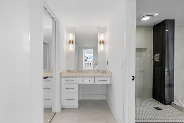 a kitchen with cabinets appliances and a sink