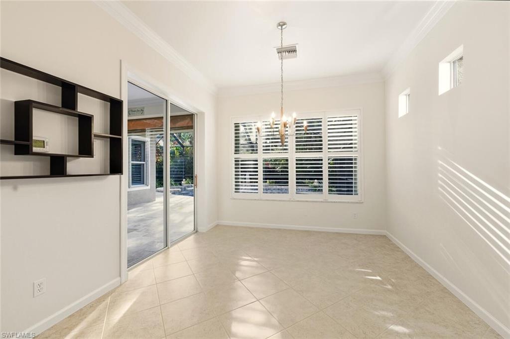 7838 Founders Circle Naples, FL 34104 - Photo 15 of 31 a view of an empty room with a window