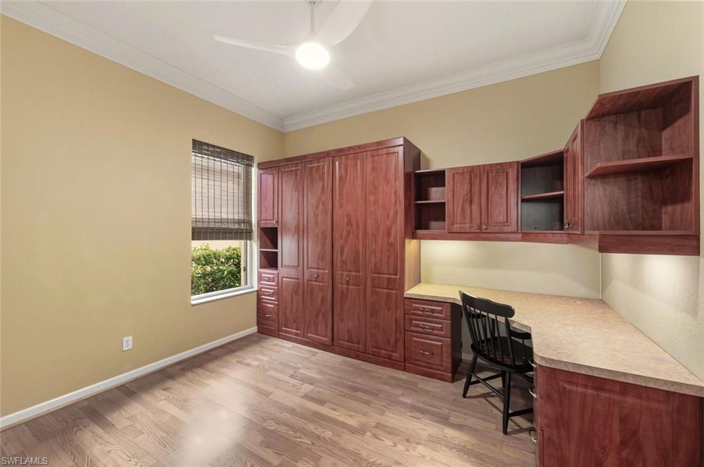 7838 Founders Circle Naples, FL 34104 - Photo 17 of 31 a workspace with furniture and window