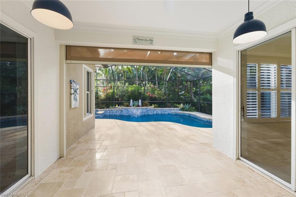 7838 Founders Circle Naples, FL 34104 - Photo 28 of 31 a view of an empty room with a window