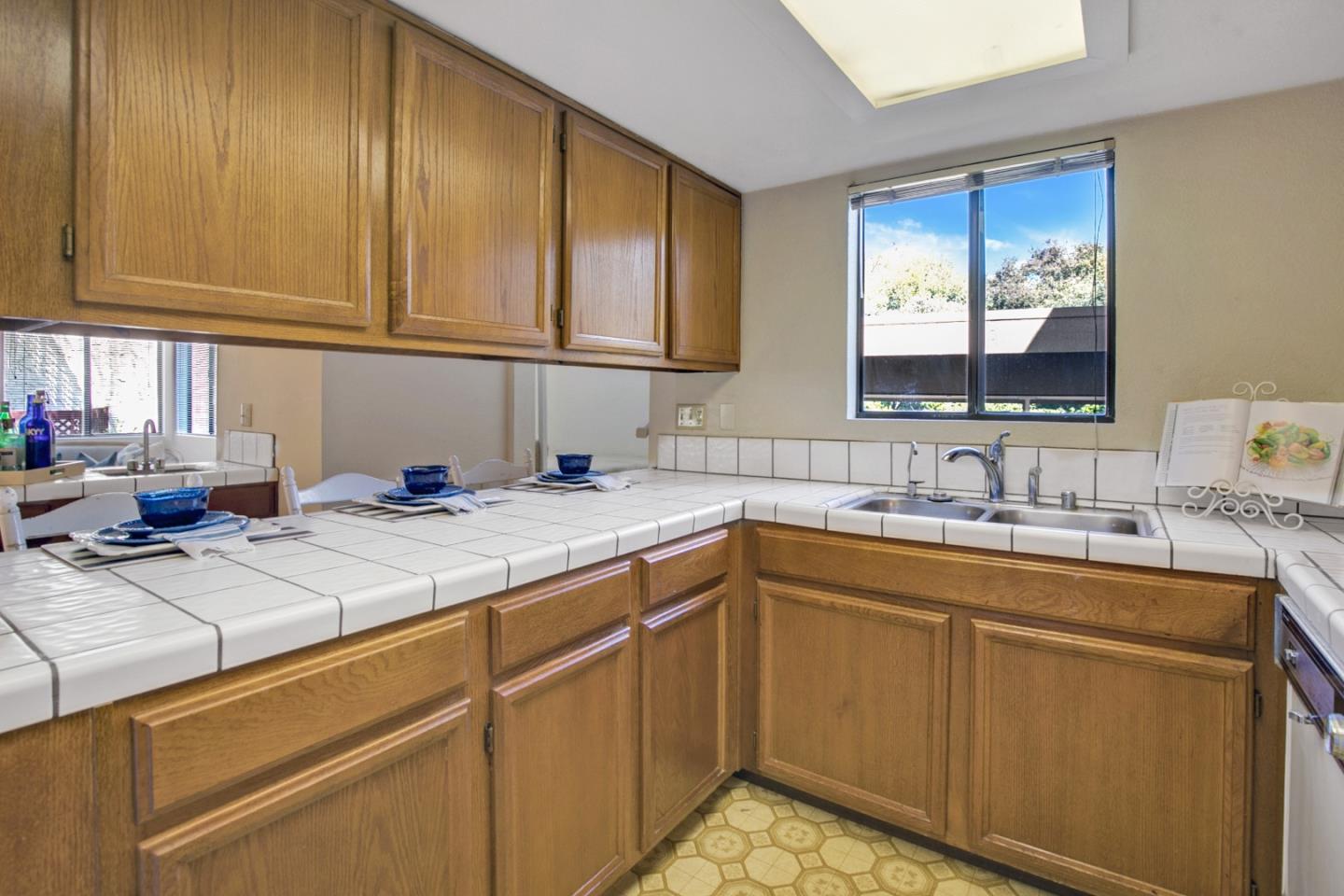 20 Seacliff Drive Aptos, CA 95003 - Photo 11 of 38 a kitchen with a sink cabinets and window