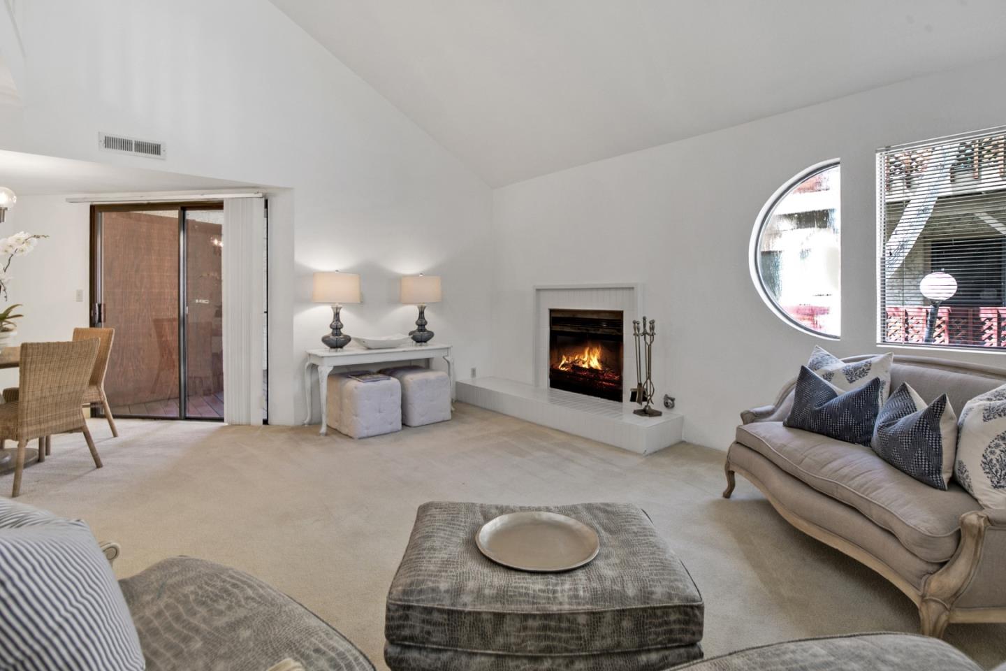 20 Seacliff Drive Aptos, CA 95003 - Photo 14 of 38 a living room with furniture and a fireplace