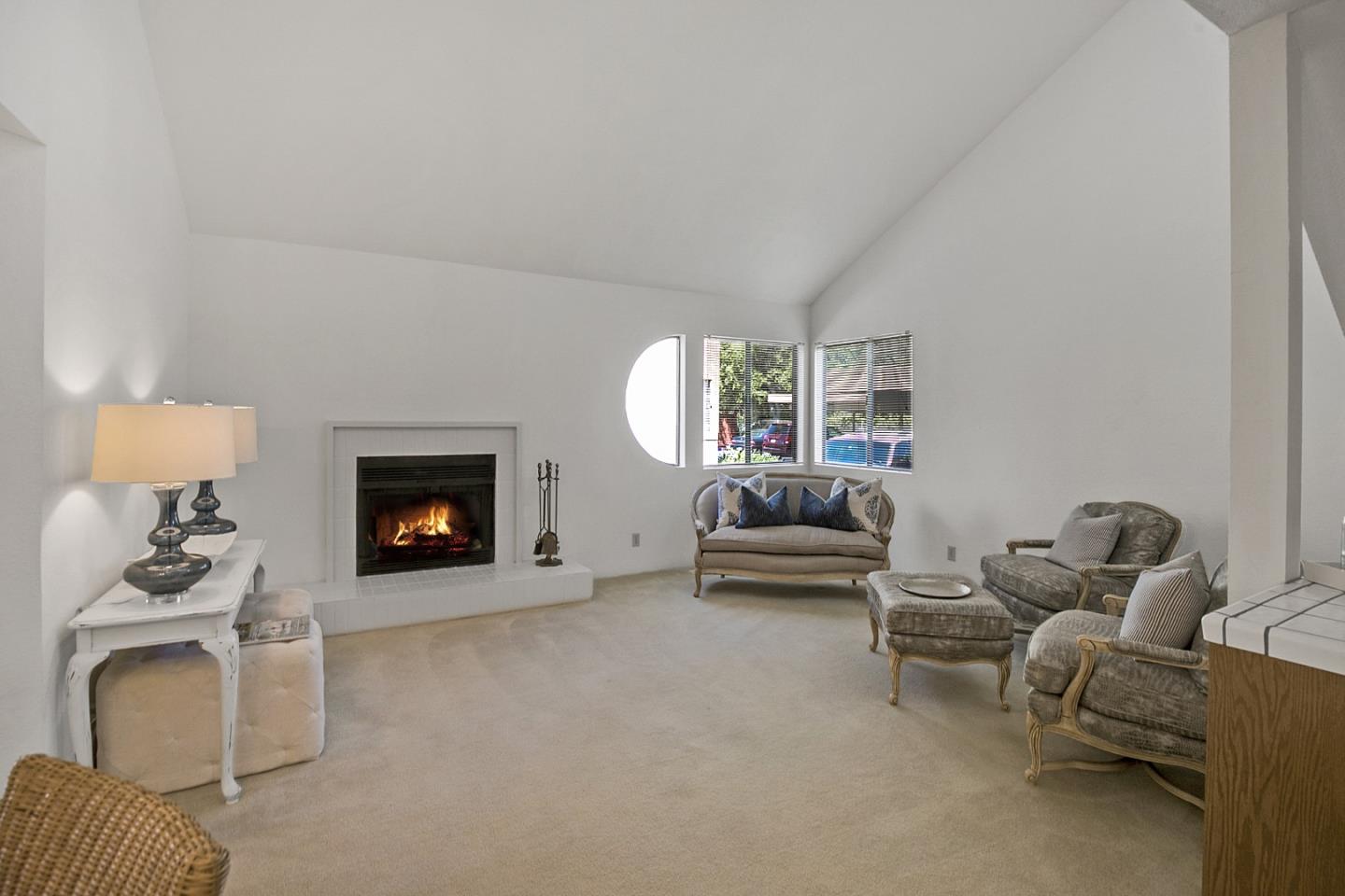 20 Seacliff Drive Aptos, CA 95003 - Photo 16 of 38 a living room with furniture and a fireplace