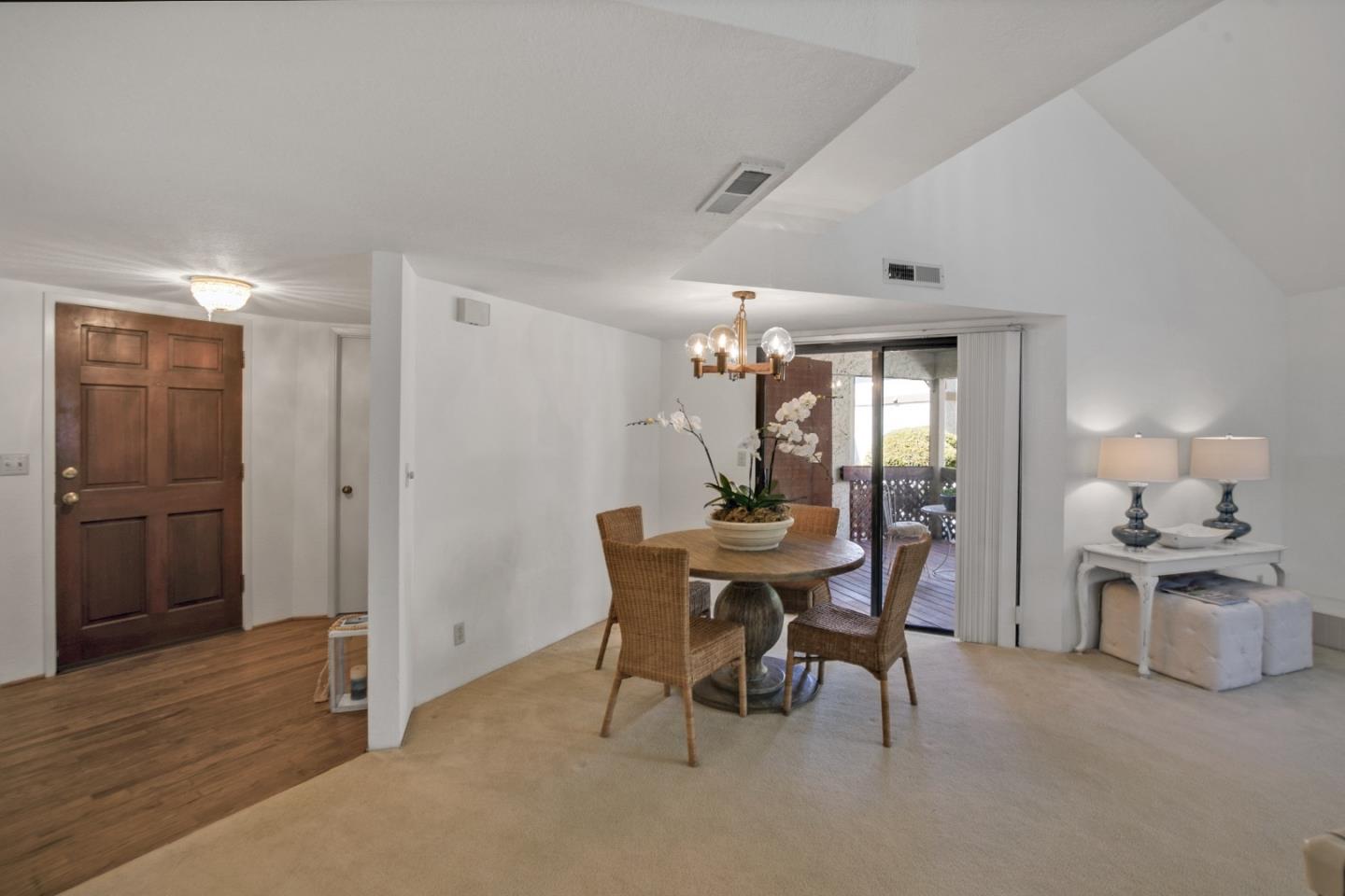 20 Seacliff Drive Aptos, CA 95003 - Photo 4 of 38 a view of a dining room with furniture and wooden floor