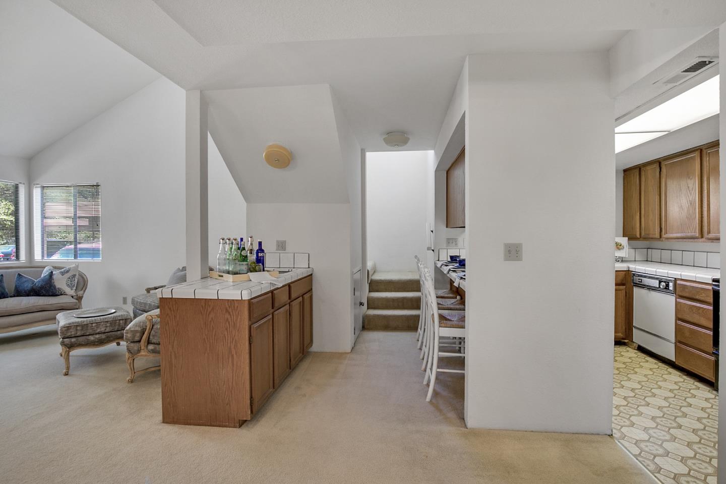20 Seacliff Drive Aptos, CA 95003 - Photo 6 of 38 a room with kitchen island stainless steel appliances a stove a sink and a refrigerator