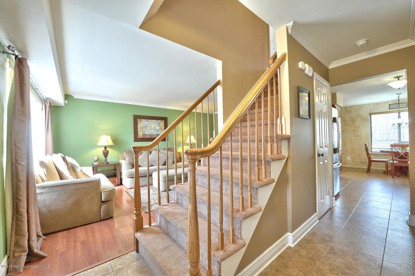 92 Starlight Road Howell, NJ 07731 - Photo 3 of 36 a view of an entryway with wooden floor and a livingroom
