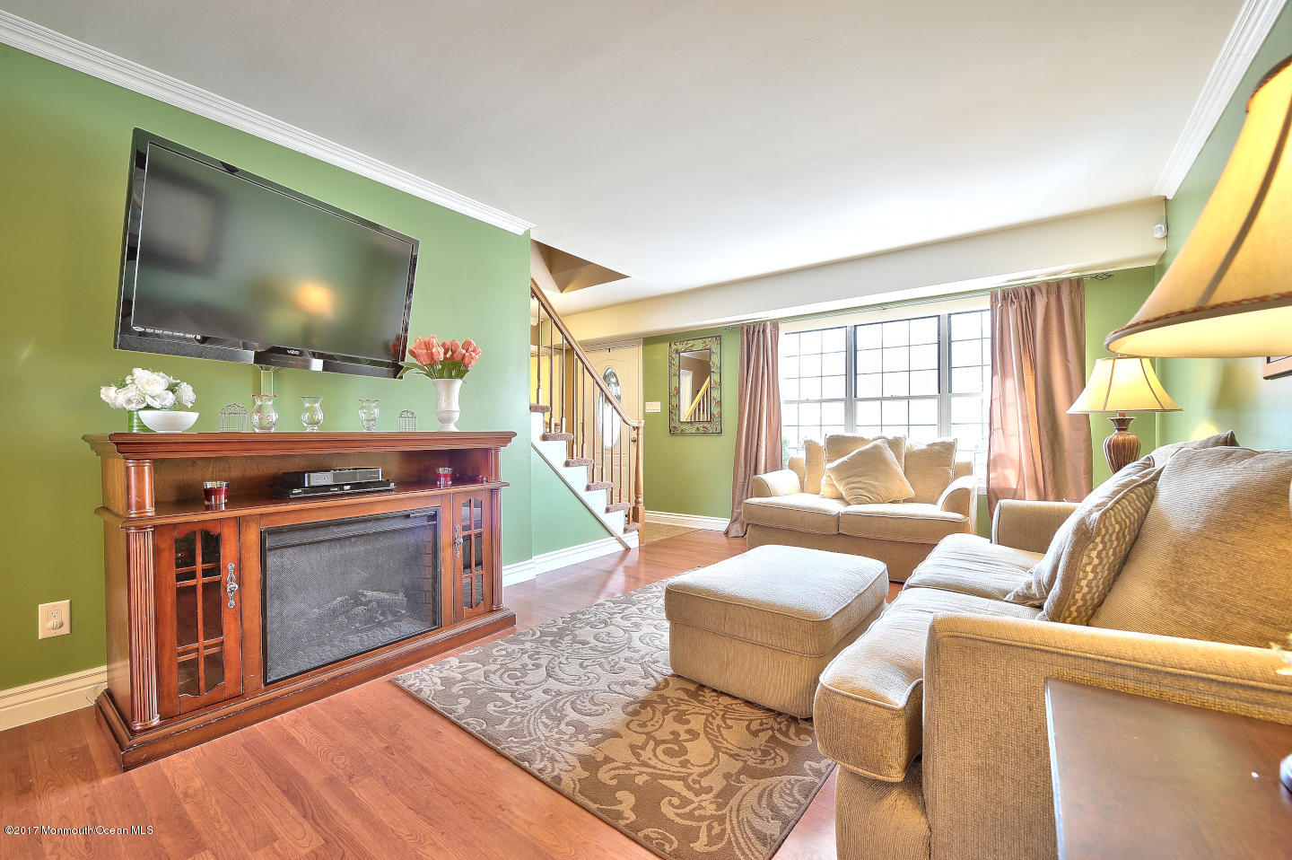 92 Starlight Road Howell, NJ 07731 - Photo 7 of 36 a living room with furniture and a flat screen tv