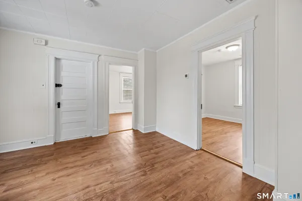 wooden floor with an empty room