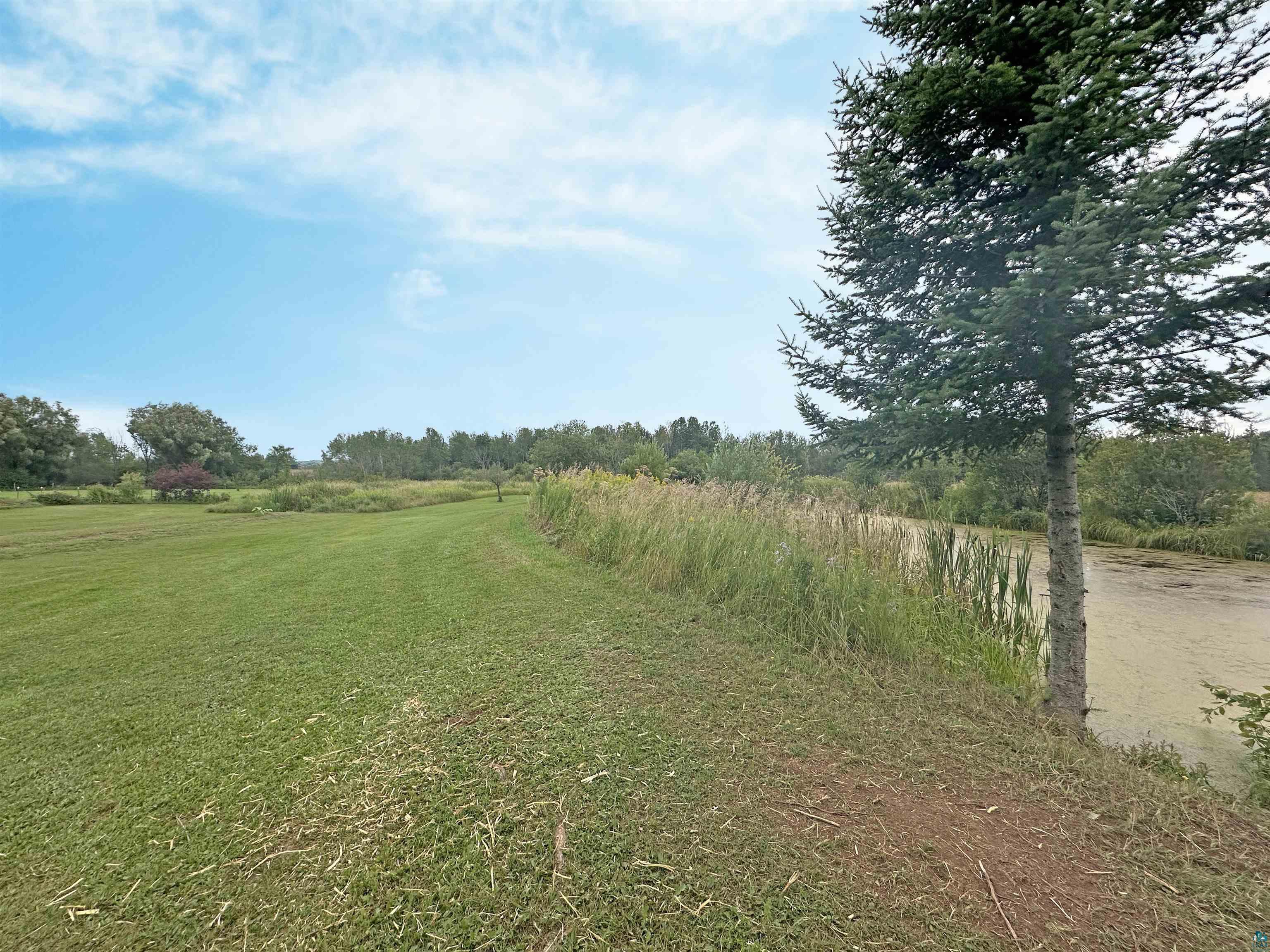 5865 Eastview Road Iron River, WI 54847 - Photo 35 of 41 View of yard with a rural view