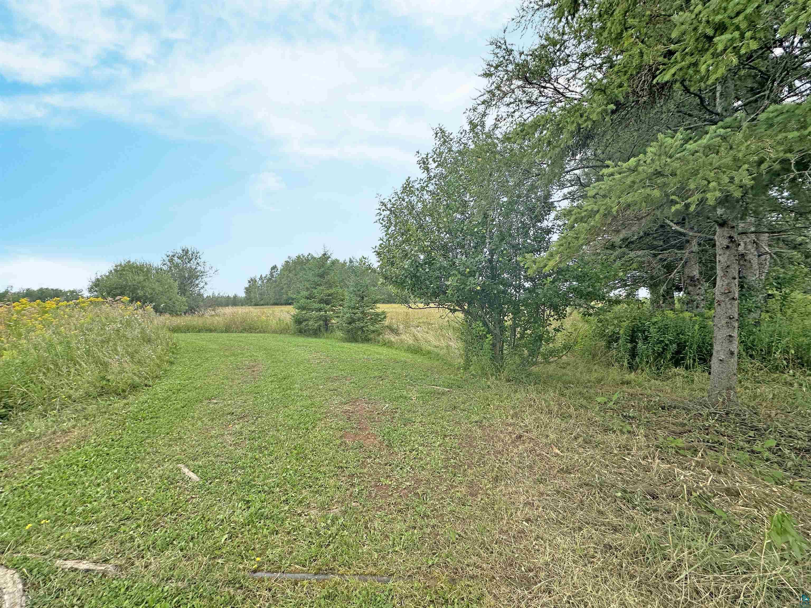 5865 Eastview Road Iron River, WI 54847 - Photo 36 of 41 View of yard with a rural view