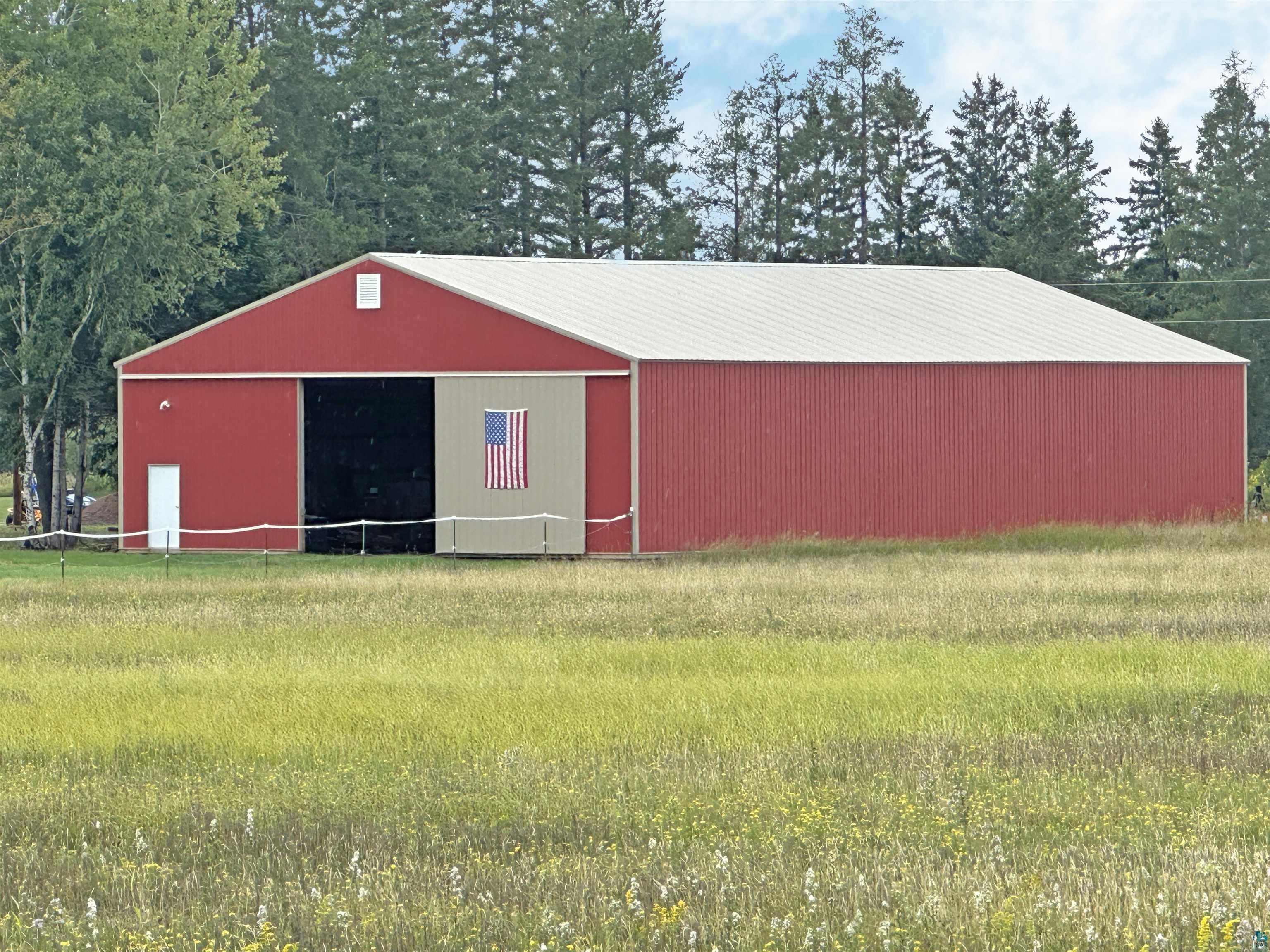 5865 Eastview Road Iron River, WI 54847 - Photo 41 of 41 View of outbuilding featuring a lawn