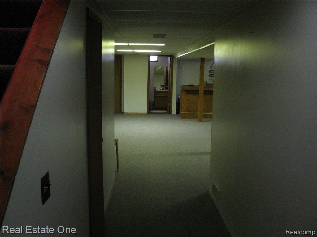 295 Coldiron Drive Rochester, MI 48307 - Photo 19 of 23 Entering Finished Basement