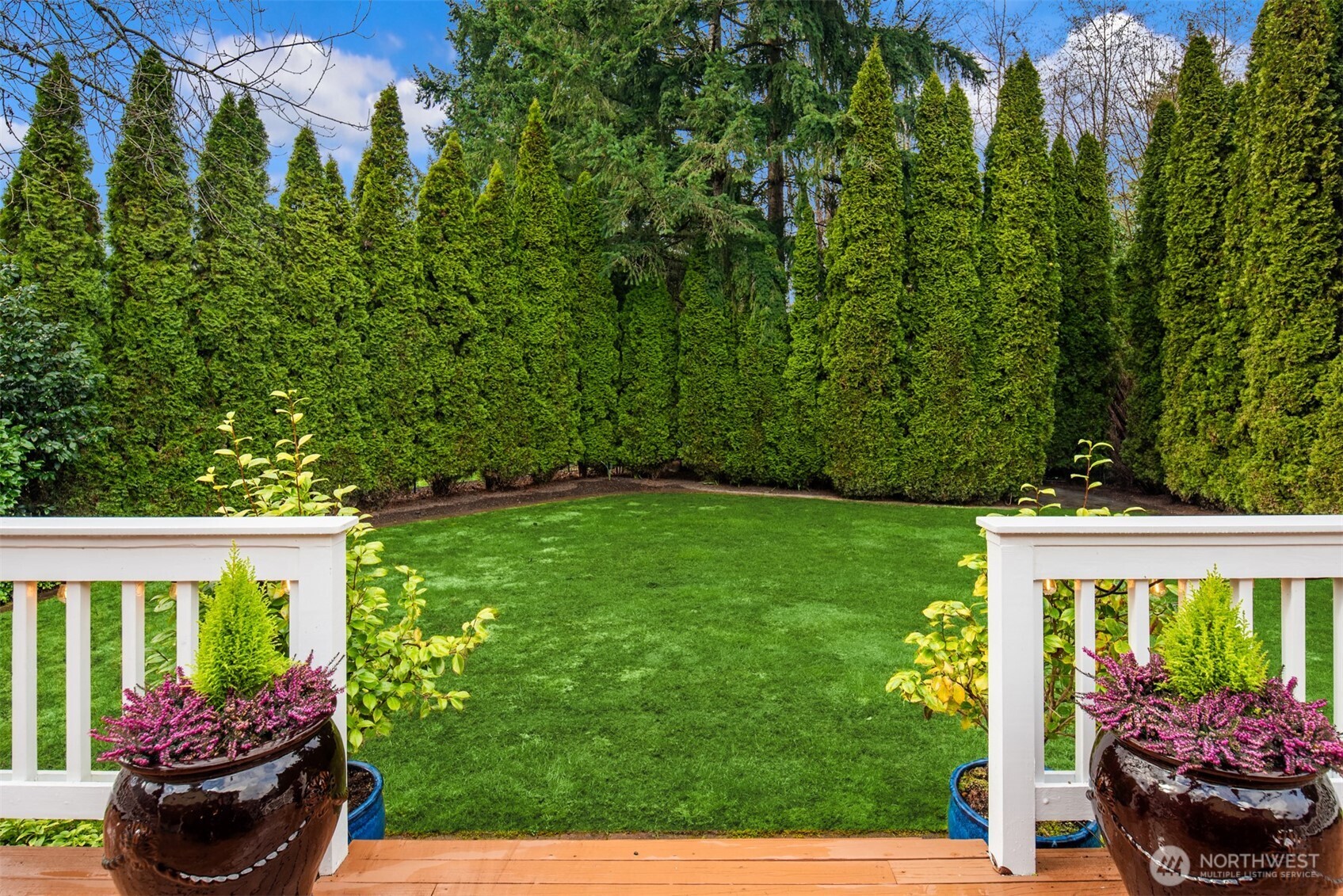 a view of a garden with a flower garden