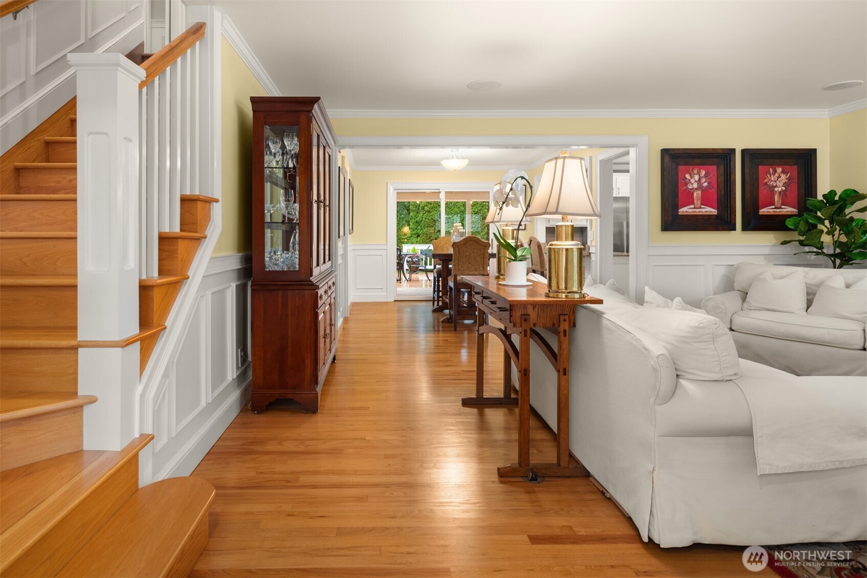 17409 113th Avenue Northeast Bothell, WA 98011 - Photo 13 of 39 a living room with furniture floor to ceiling window and a flat screen tv