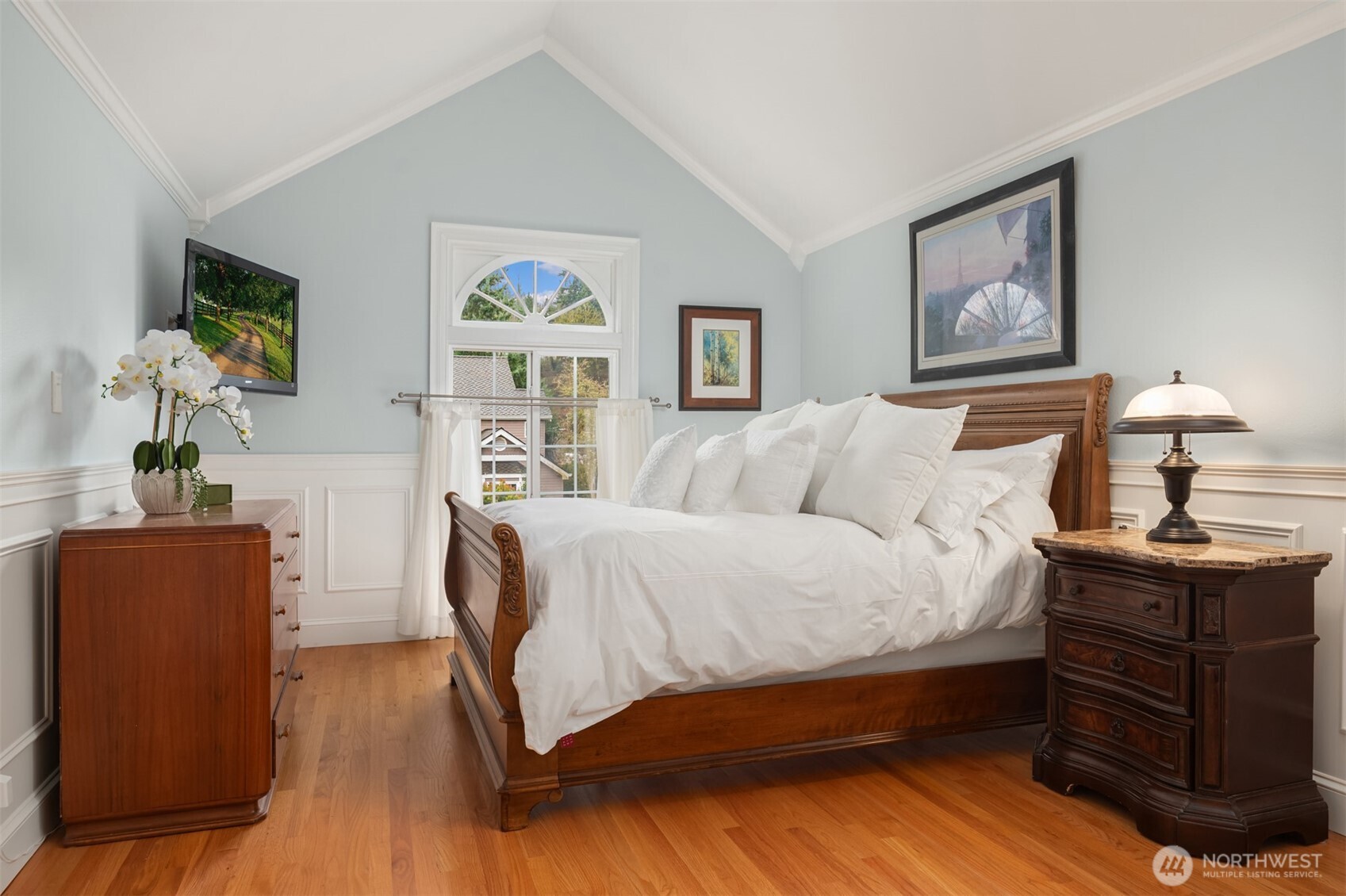 17409 113th Avenue Northeast Bothell, WA 98011 - Photo 18 of 39 a bedroom with a bed and wooden floor