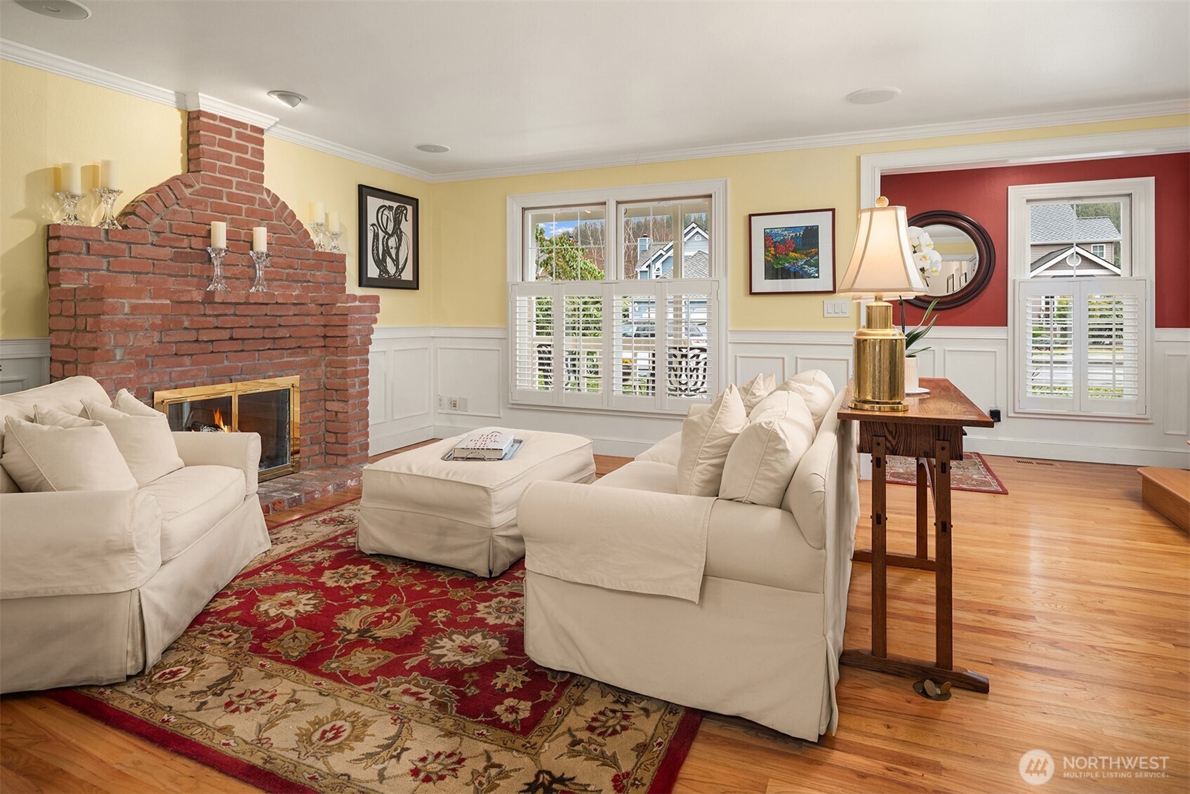 17409 113th Avenue Northeast Bothell, WA 98011 - Photo 19 of 39 a living room with furniture and a fireplace