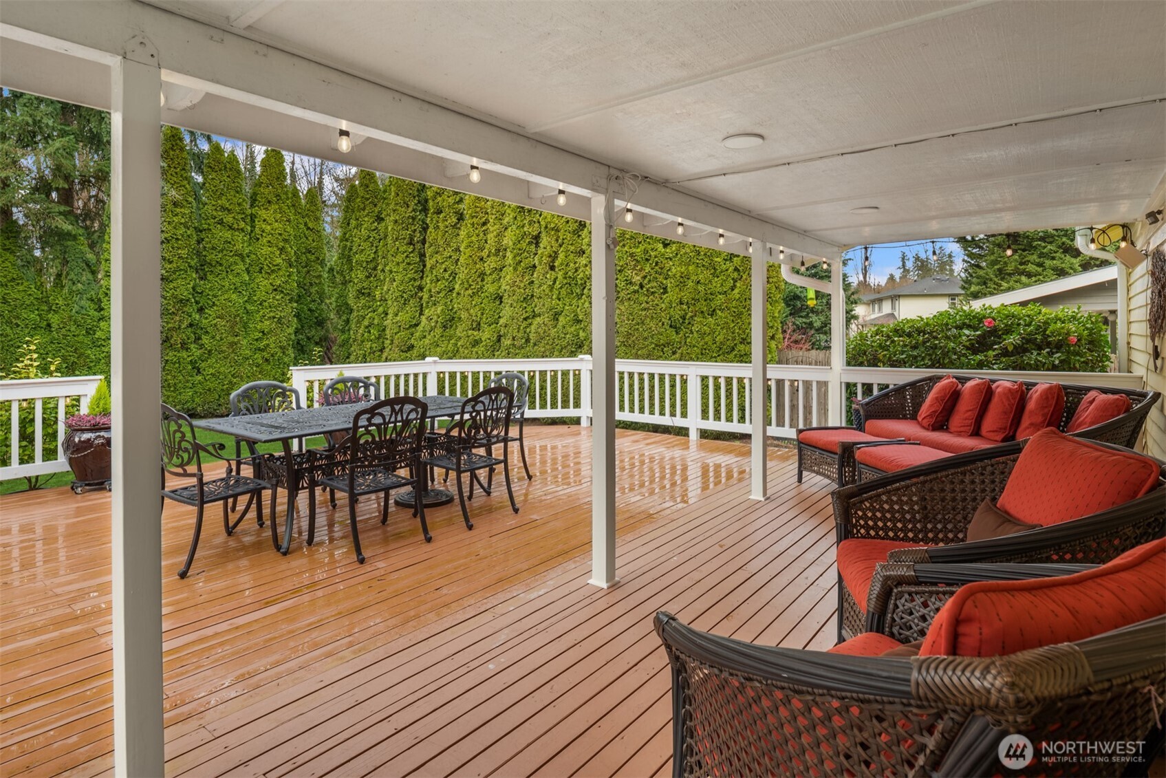 17409 113th Avenue Northeast Bothell, WA 98011 - Photo 24 of 39 a outdoor view with a sitting space and large windows