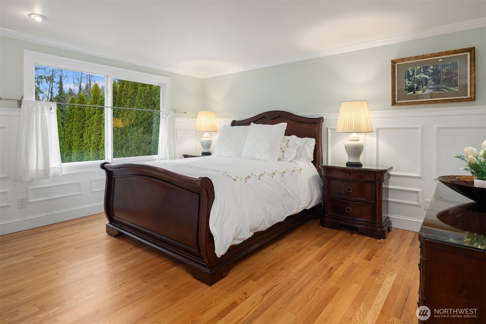 17409 113th Avenue Northeast Bothell, WA 98011 - Photo 29 of 39 a bedroom with a bed and wooden floor