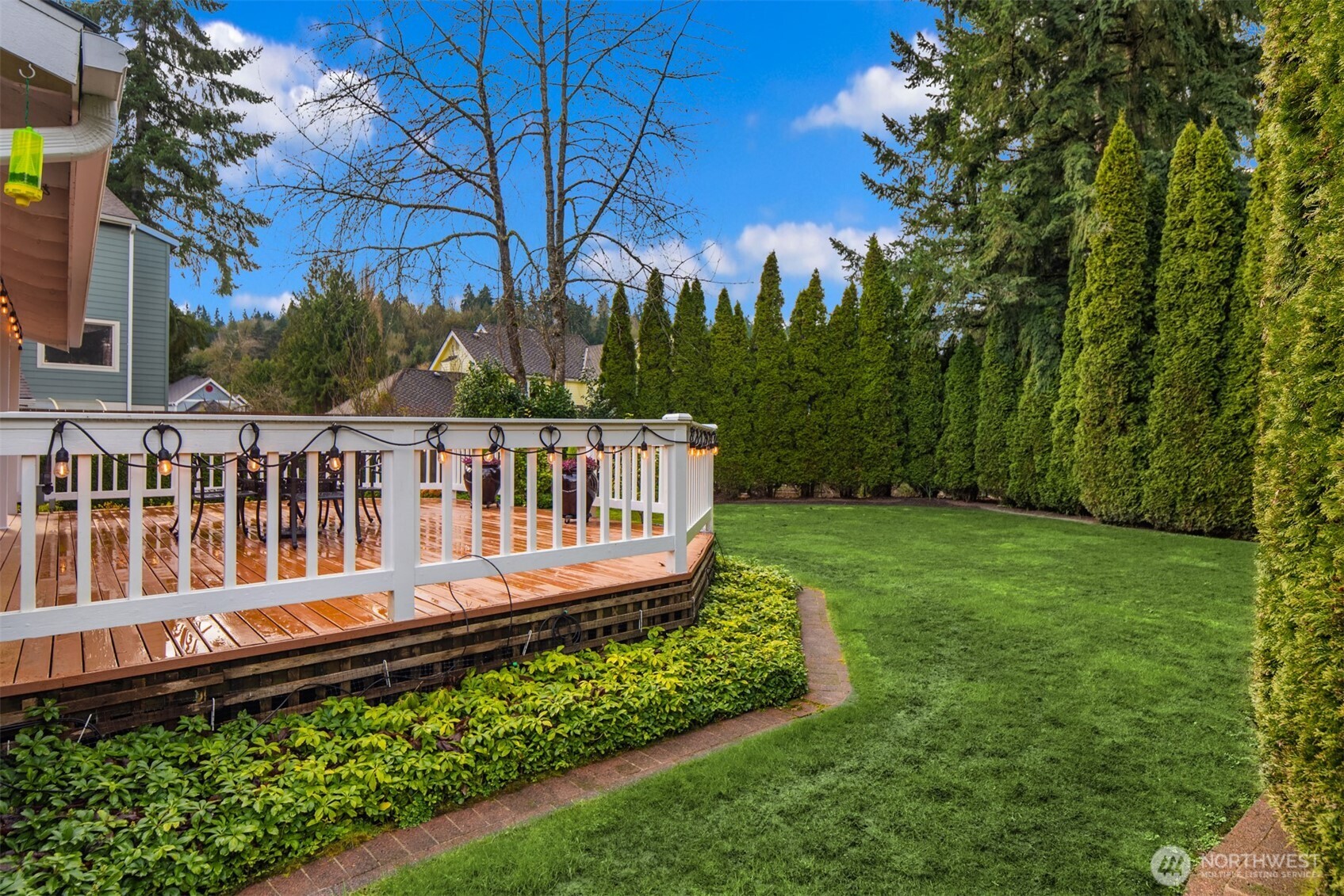 17409 113th Avenue Northeast Bothell, WA 98011 - Photo 31 of 39 a view of a wooden deck with a big yard