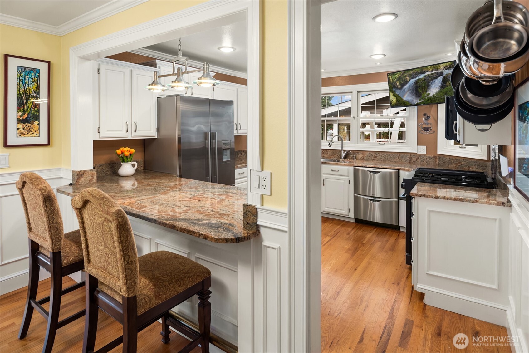 17409 113th Avenue Northeast Bothell, WA 98011 - Photo 35 of 39 a kitchen with a table and chairs in it