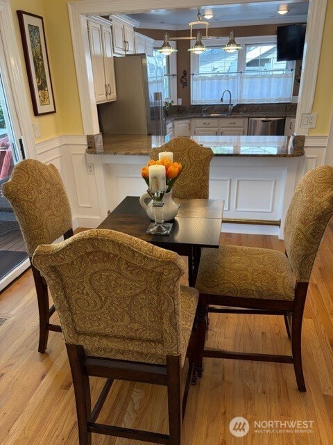 17409 113th Avenue Northeast Bothell, WA 98011 - Photo 8 of 39 a living room with furniture and a rug