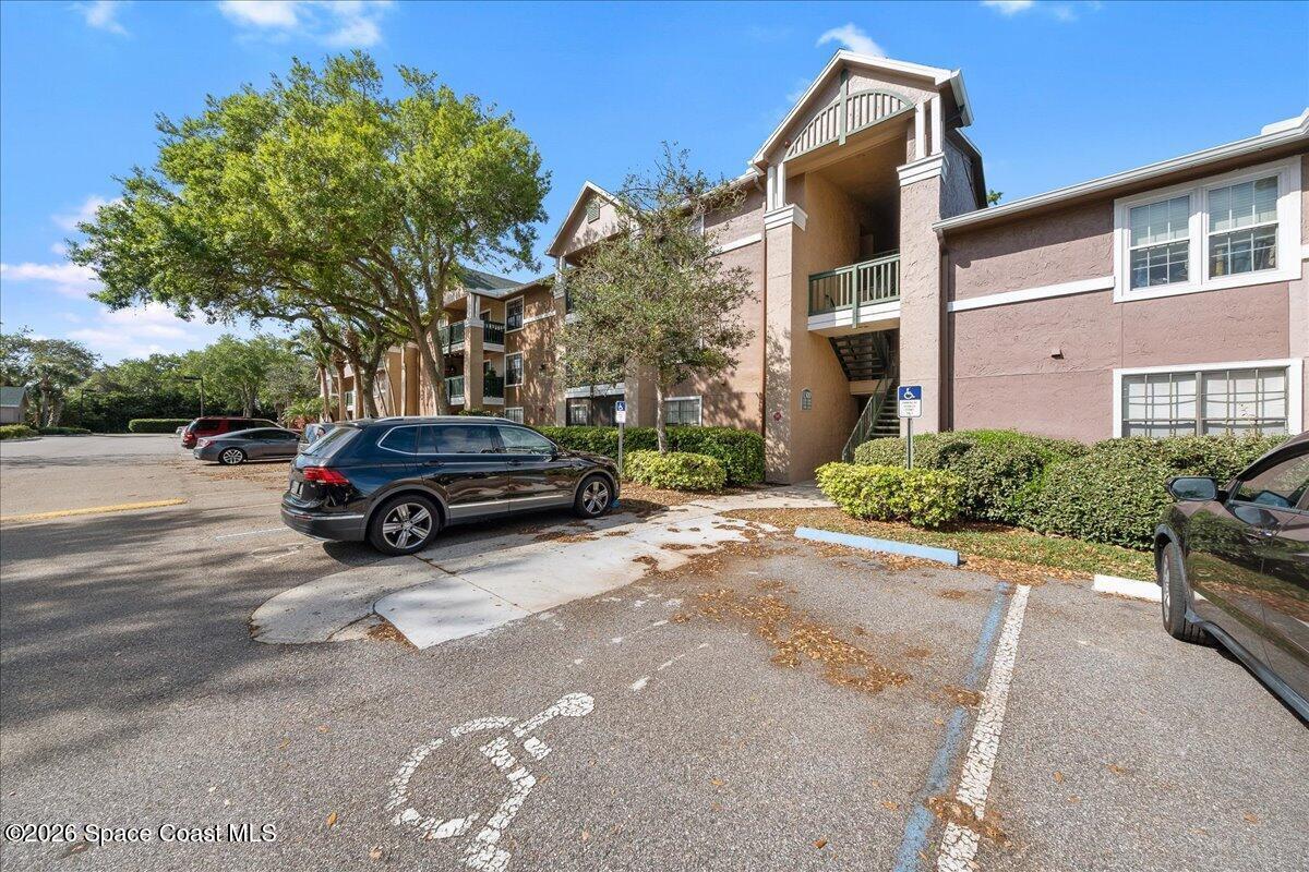 7667 North Wickham Road, Unit 1308 Melbourne, FL 32940 - Photo 1 of 22 front of building