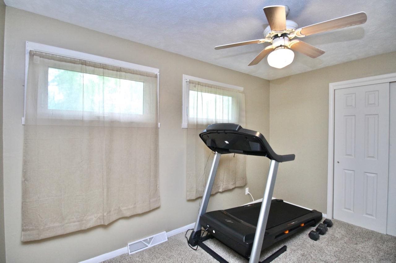 4613 Cayuga Road Rockford, IL 61107 - Photo 13 of 19 a view of a room with gym equipment