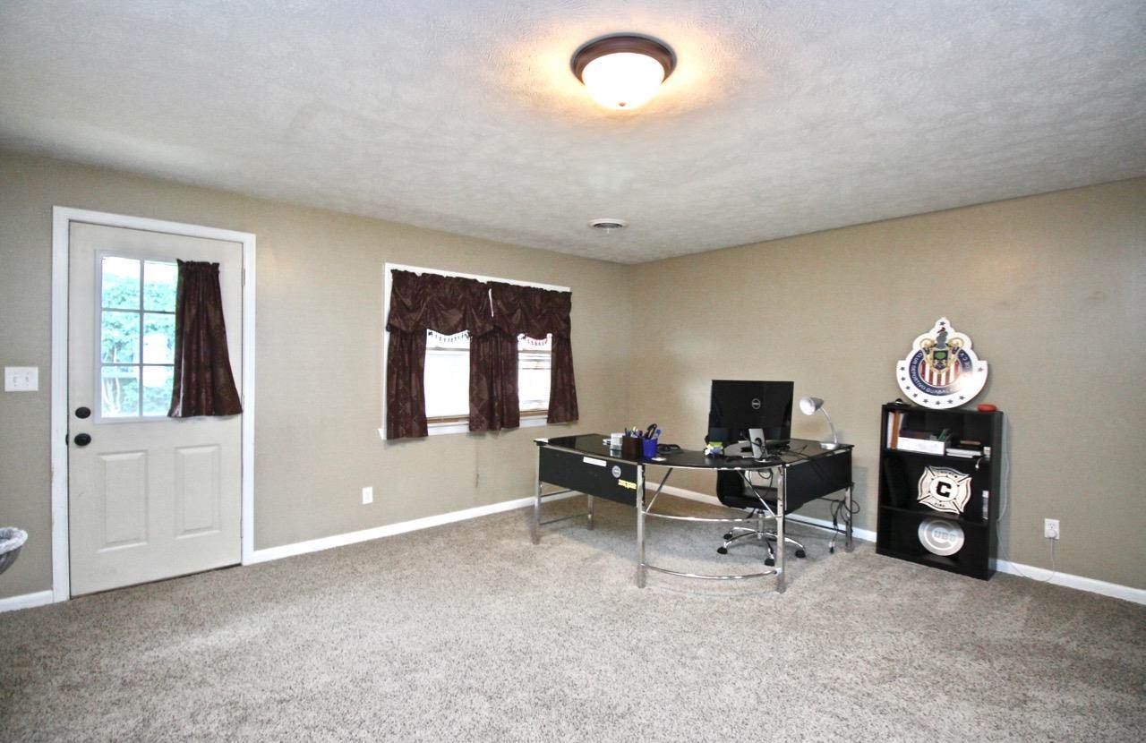 4613 Cayuga Road Rockford, IL 61107 - Photo 15 of 19 an empty room with furniture and windows