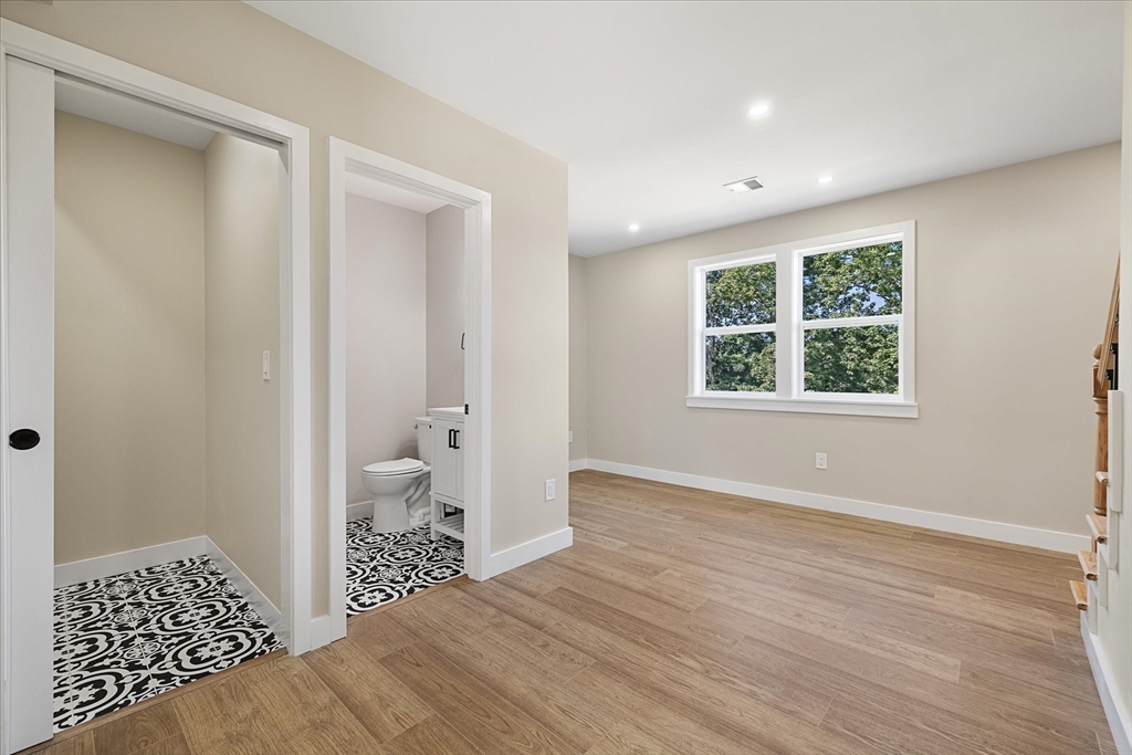 8 Wilson Street Spencer, MA 01562 - Photo 15 of 41 a view of room with window and hardwood floor