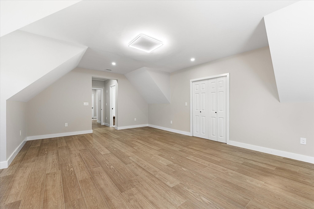 8 Wilson Street Spencer, MA 01562 - Photo 20 of 41 a view of an empty room with wooden floor