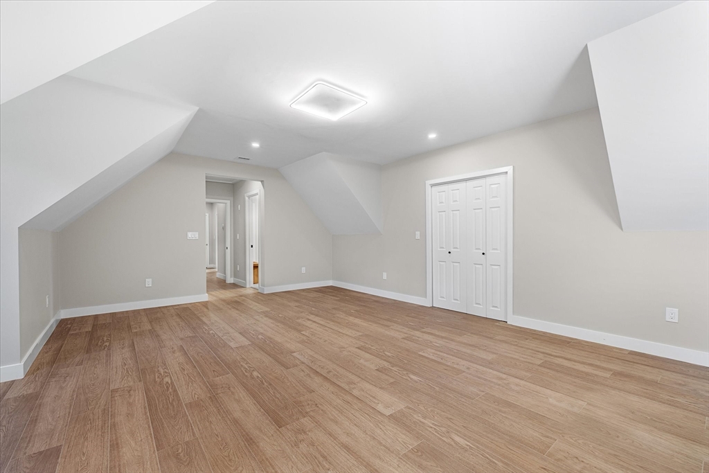 8 Wilson Street Spencer, MA 01562 - Photo 22 of 41 a view of an empty room with wooden floor