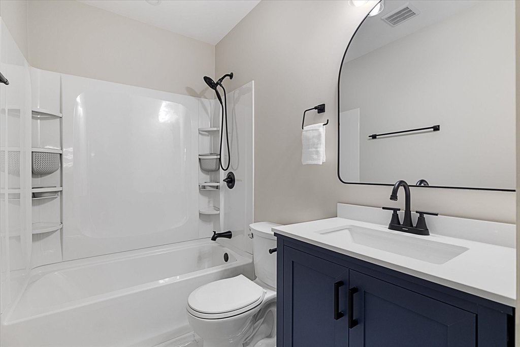 8 Wilson Street Spencer, MA 01562 - Photo 27 of 41 a bathroom with a sink toilet and shower