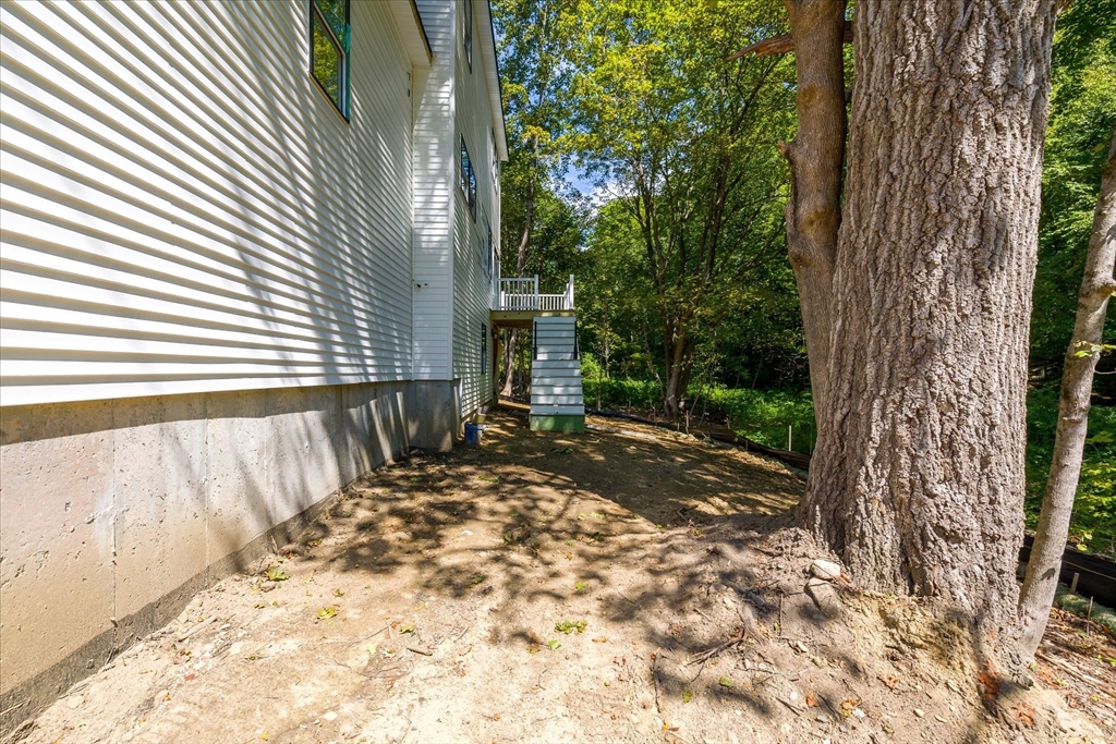 8 Wilson Street Spencer, MA 01562 - Photo 35 of 41 a view of backyard with a large tree