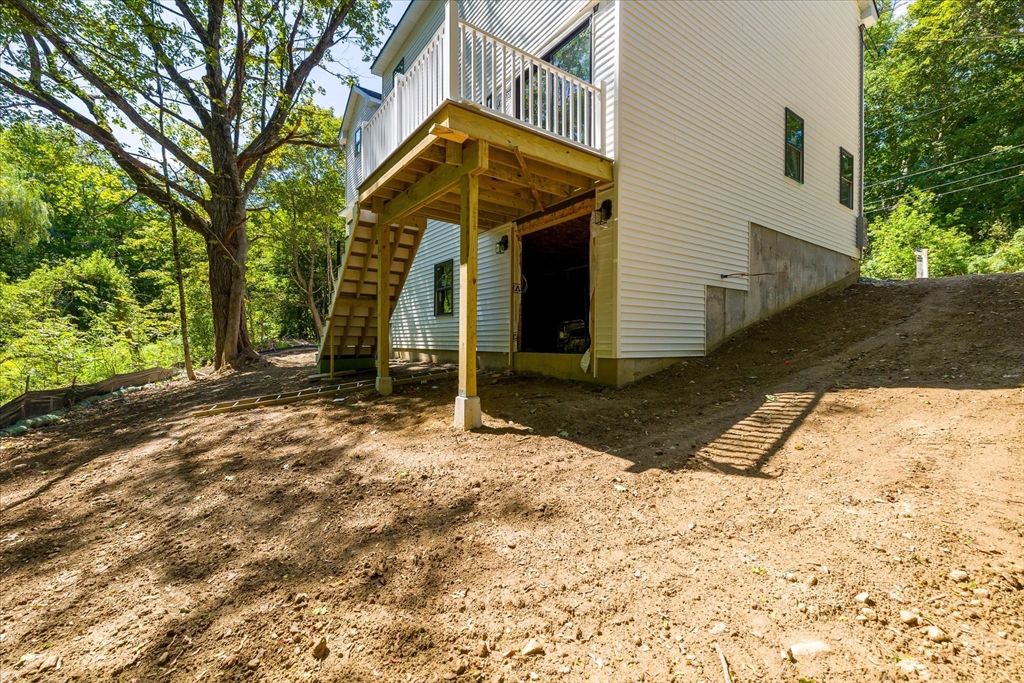8 Wilson Street Spencer, MA 01562 - Photo 36 of 41 a view of a house with a yard