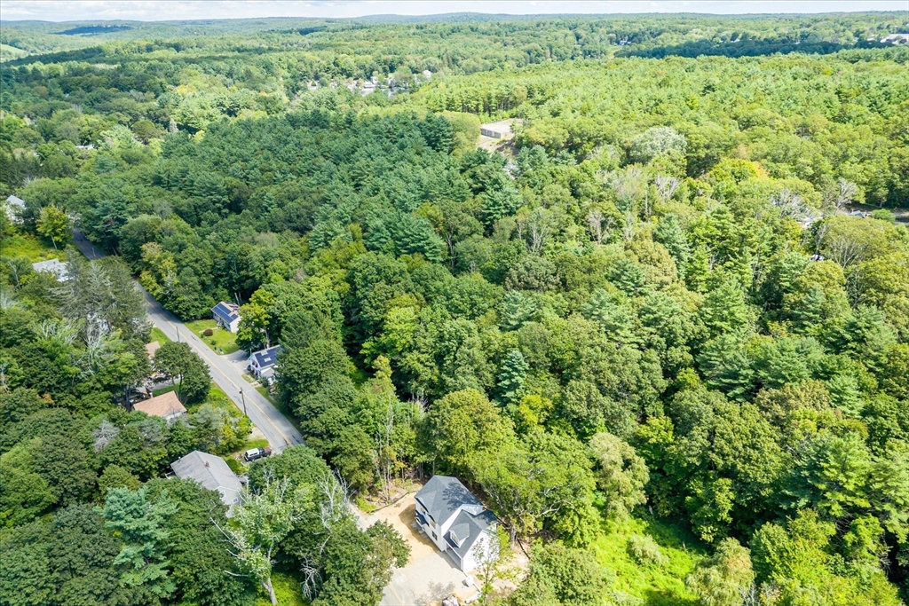 8 Wilson Street Spencer, MA 01562 - Photo 38 of 41 an aerial view of residential house with outdoor space and trees all around