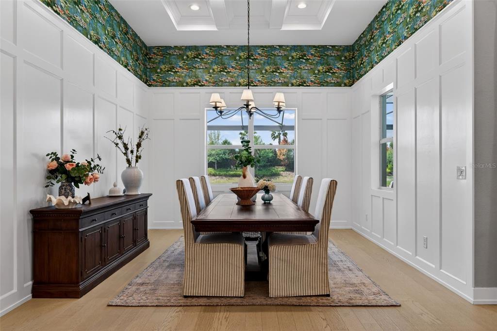 8331 Redonda Loop Lakewood Ranch, FL 34202 - Photo 23 of 92 a view of a dining room with furniture window and outside view
