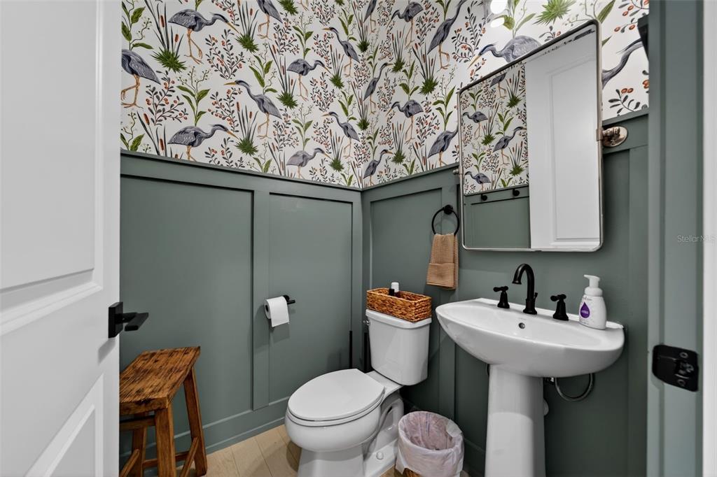 8331 Redonda Loop Lakewood Ranch, FL 34202 - Photo 24 of 92 a bathroom with a toilet sink and mirror