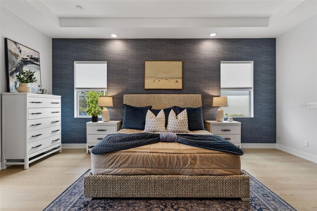 8331 Redonda Loop Lakewood Ranch, FL 34202 - Photo 26 of 92 a bedroom with a bed and dresser