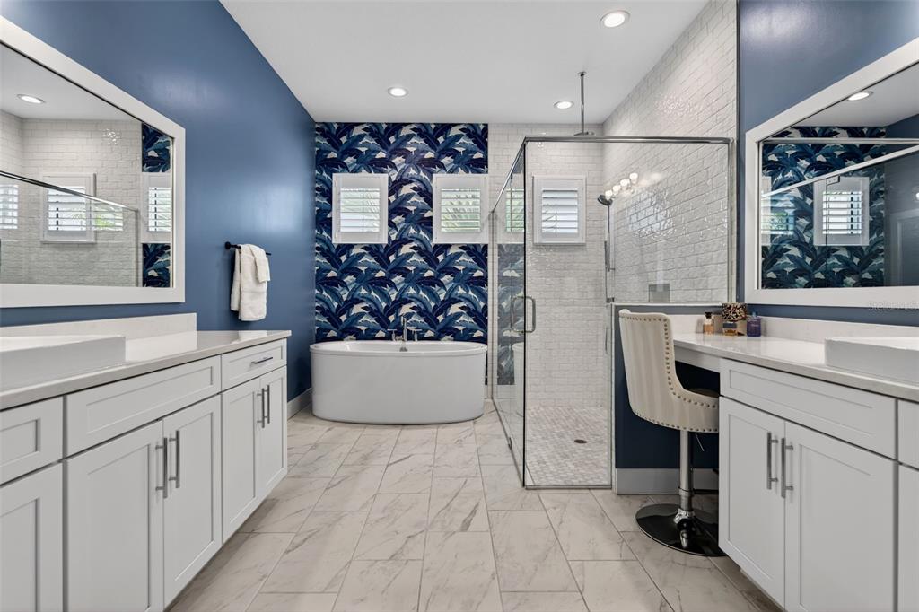 8331 Redonda Loop Lakewood Ranch, FL 34202 - Photo 32 of 92 a bathroom with a double vanity sink mirror and shower