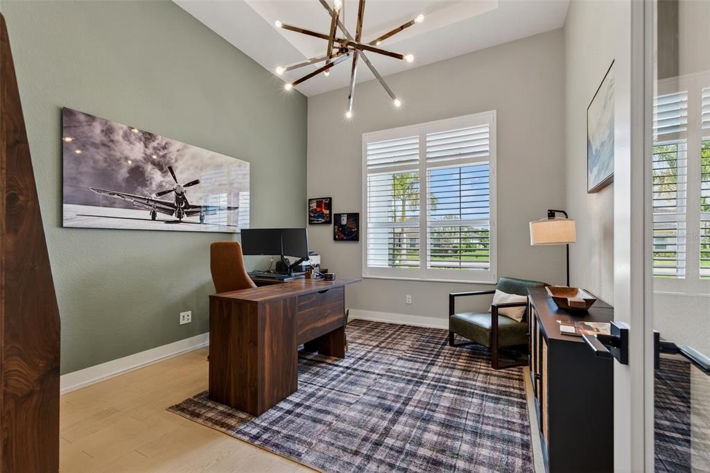 8331 Redonda Loop Lakewood Ranch, FL 34202 - Photo 35 of 92 a view of a workspace with furniture and a window