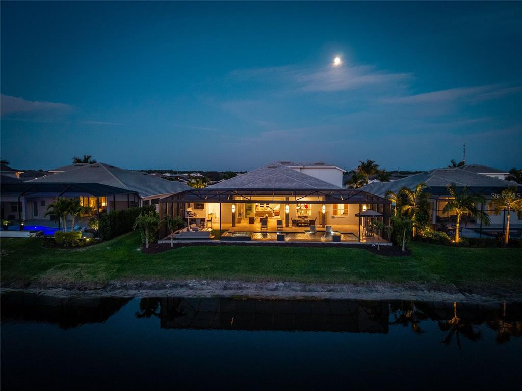 8331 Redonda Loop Lakewood Ranch, FL 34202 - Photo 63 of 92 a view of yard with swimming pool and green space