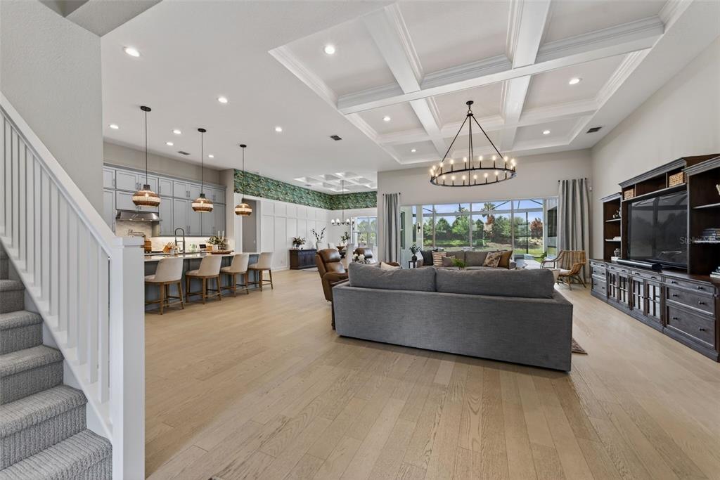 8331 Redonda Loop Lakewood Ranch, FL 34202 - Photo 10 of 92 a living room with furniture and a flat screen tv