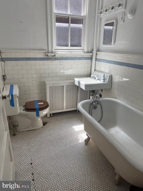 331 5th Street Southeast Washington, DC 20003 - Photo 17 of 27 a kitchen with a sink and a stove top oven