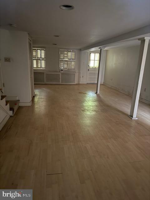 331 5th Street Southeast Washington, DC 20003 - Photo 19 of 27 an empty room with wooden floor and windows